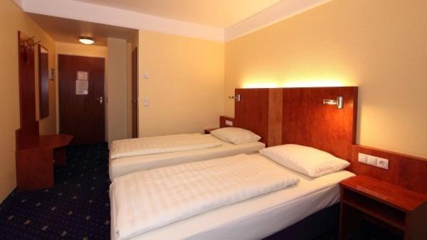 Aparthotel Astro - Nichtraucherhotel Στουτγκάρδη Δωμάτιο φωτογραφία